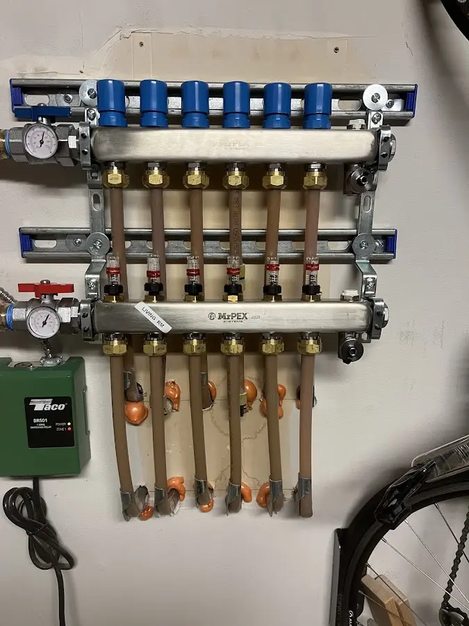 Plumber performing Water Heater Repair at a residential property in Hamburg